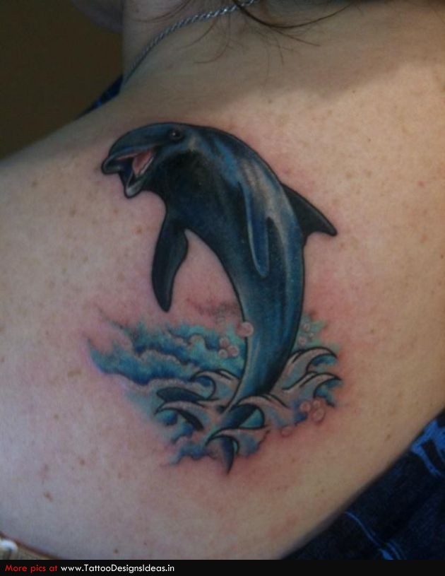 Dolphin tattoo on shoulder