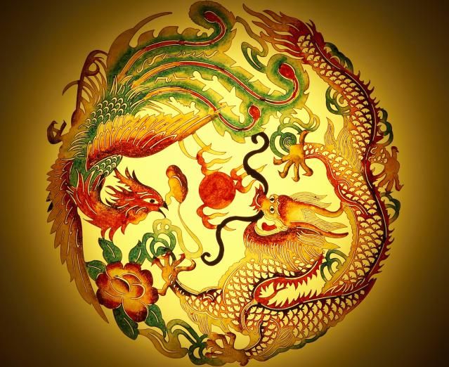 Dragon and phoenix stencil on yellow background