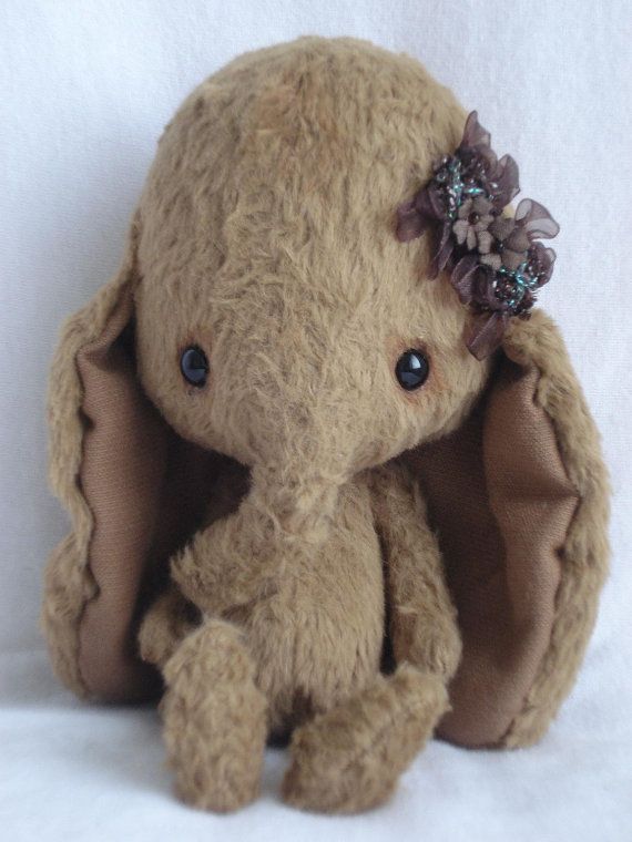 Hand-Knit Stuffed Toy Girl Bunny. $50.00, via Etsy 