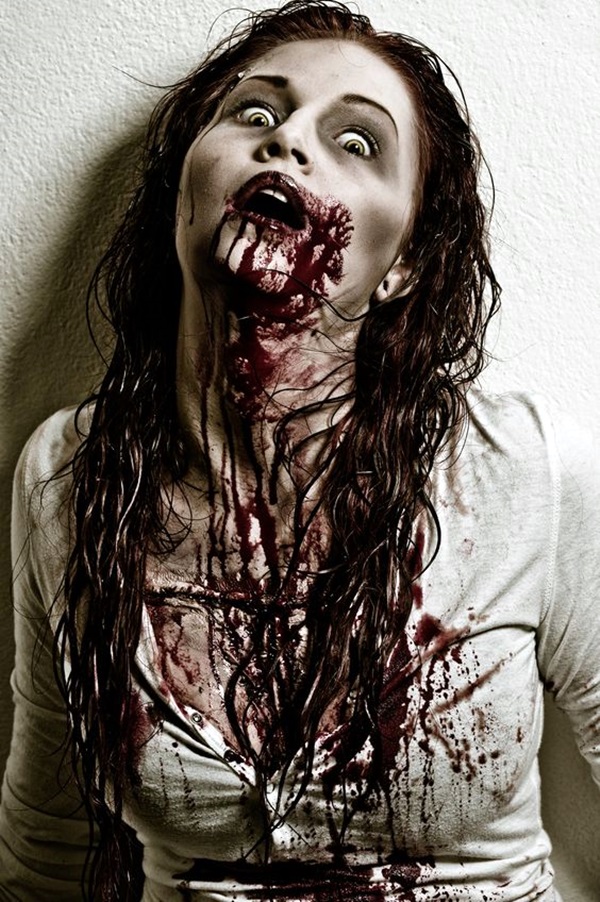 a bloody and scary looking zombie girl