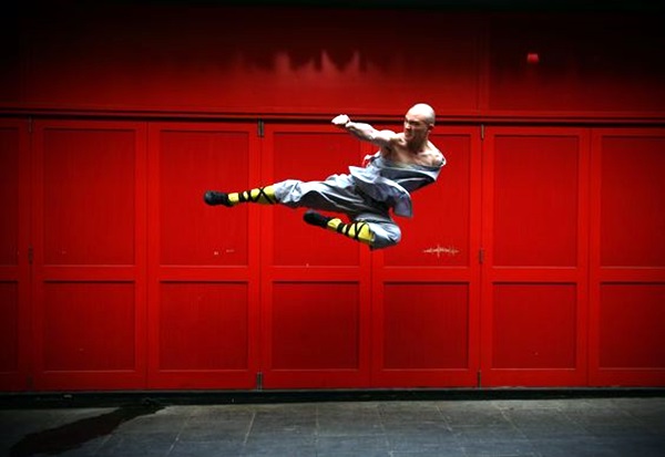 LONDON, ENGLAND - FEBRUARY 23: A Shaolin monk poses for a photograph in Chinatown on February 23, 2015 in London, England. The monks practice Shaolin Kung Fu which is believed to be the oldest institutionalised style of kung fu and are demonstrating their skills while in the UK. (Photo by Carl Court/Getty Images)