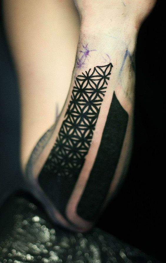 Big, Brooding, And Bewilderingly Difficult To Ignore Blackout Tattoos